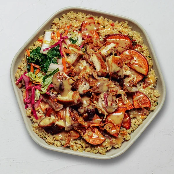 Sweetgreen Hot Honey Chicken protein plate pictured in the dated menu evidence